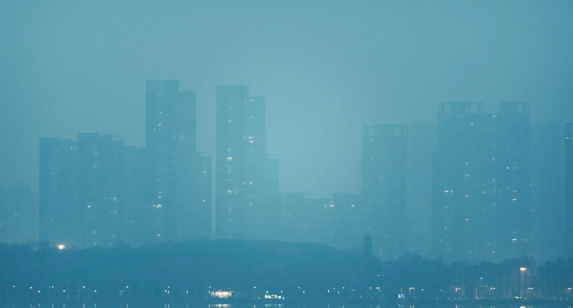 Hazy skies over city landscape